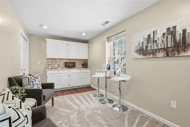 a kitchen with a sink cabinets and window