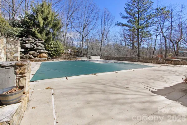 a view of a swimming pool with an outdoor space