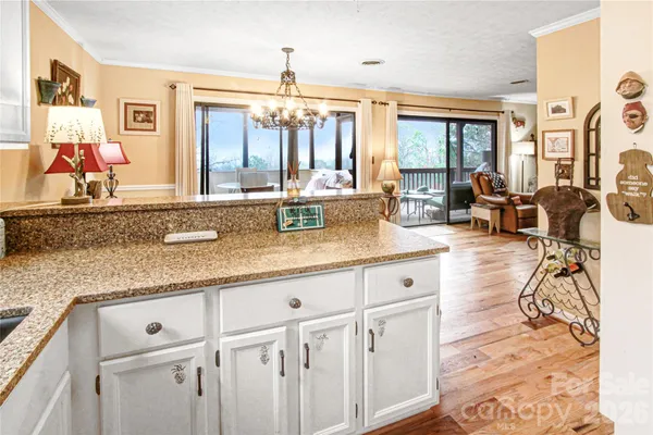 a spacious bathroom with double vanity and a mirror