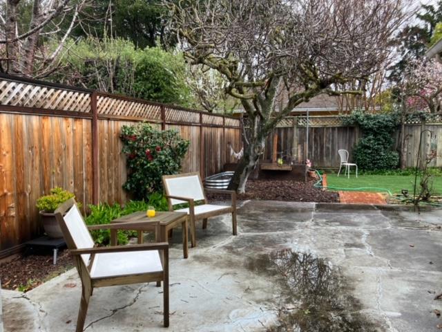 310 McKendry Drive Menlo Park, CA 94025 - Photo 11 of 14 a view of a chairs and table in backyard