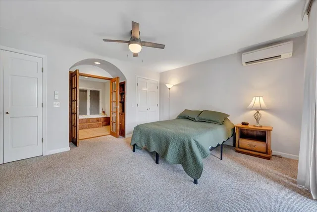 an aerial view of a houses with outdoor space and lake view