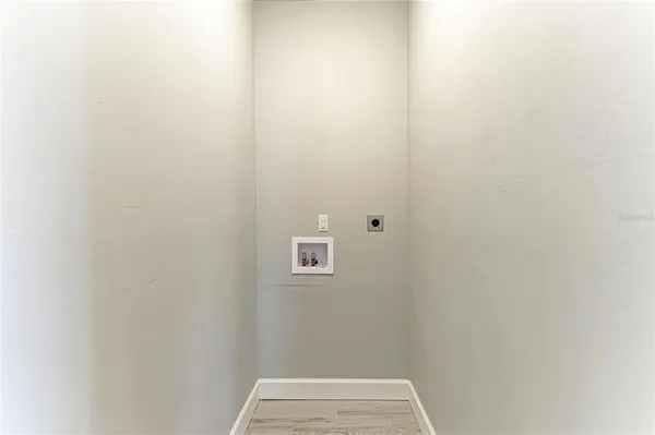 a bathroom with a shower and a toilet
