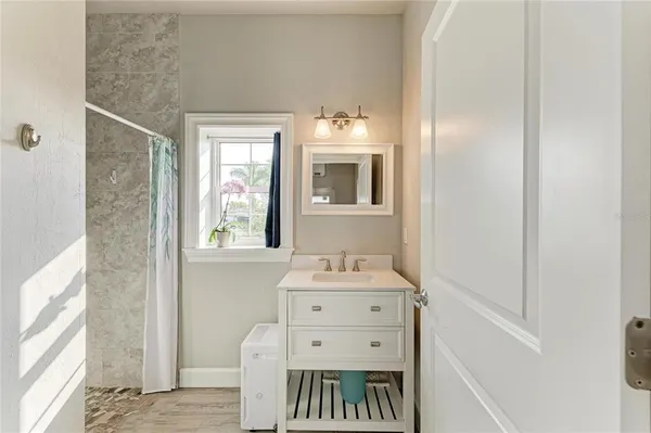 a room with furniture and wooden floor