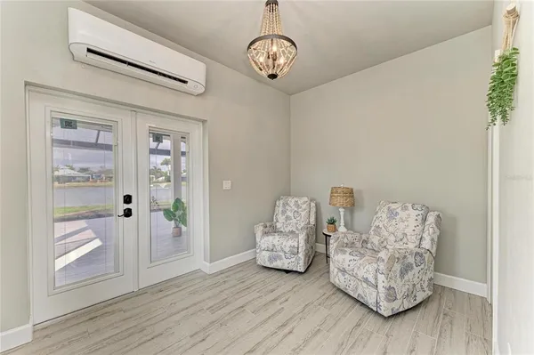 a view of livingroom with furniture and wooden floor