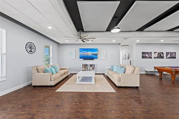 a room with furniture and wooden floor
