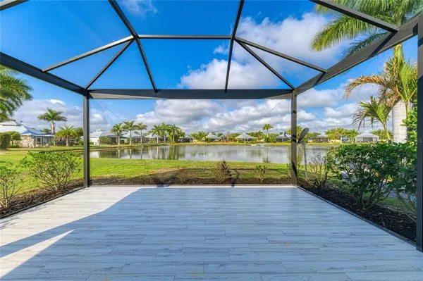 a view of a lake with a big yard