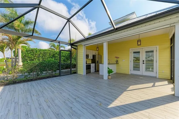 a view of a lake with a wooden floor
