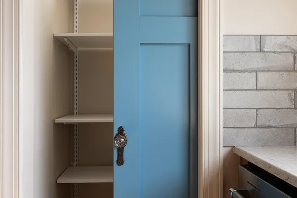a bathroom with a double vanity sink and mirror