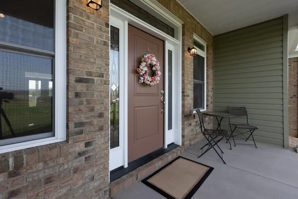 a front view of a house with a door