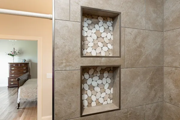 a bathroom with a toilet sink a shower and