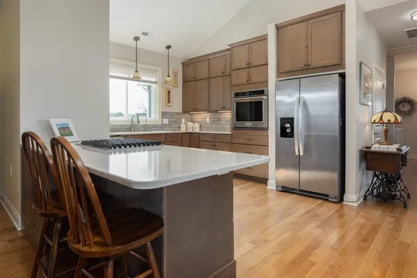 a kitchen with a sink and a window