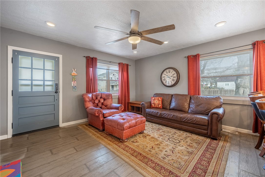 436 Marjorie Avenue Riverside, OH 45404 - Photo 4 of 34 This inviting living space features warm flooring and ample natural light, perfect for everyday living.