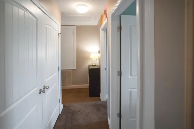 a view of a bathroom with a glass door shower