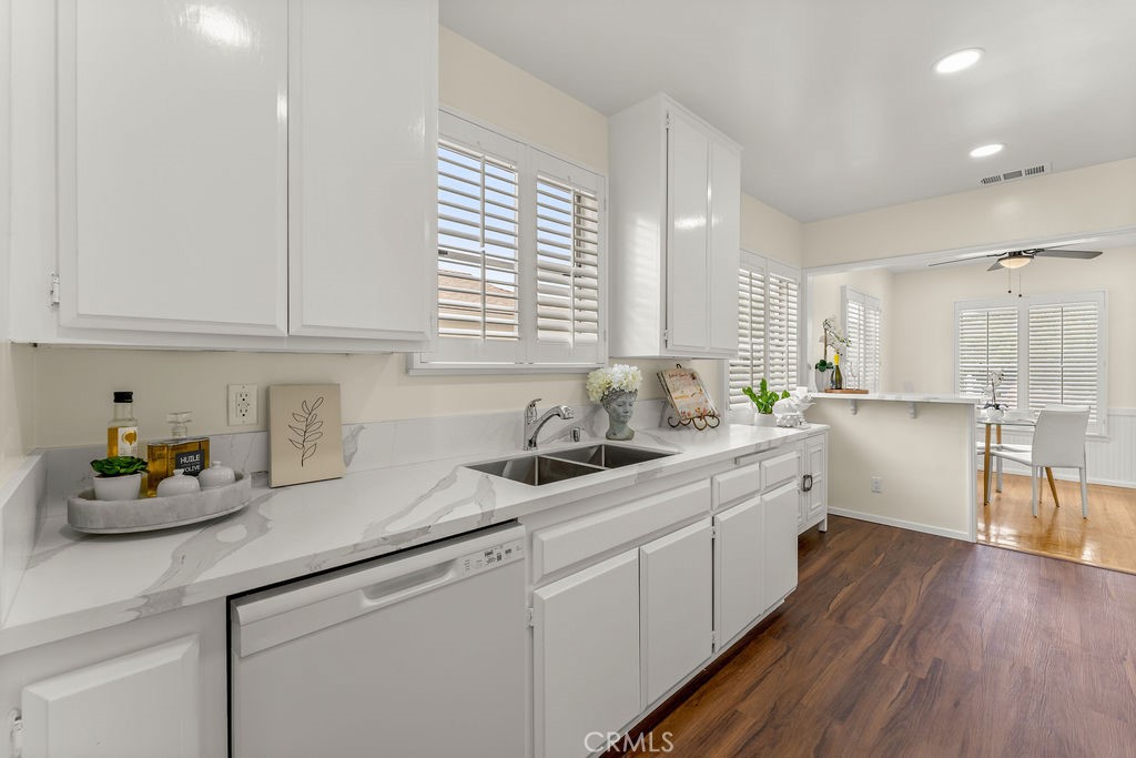 14622 Danbrook Drive Whittier, CA 90604 - Photo 16 of 38 a kitchen with sink and wooden cabinets