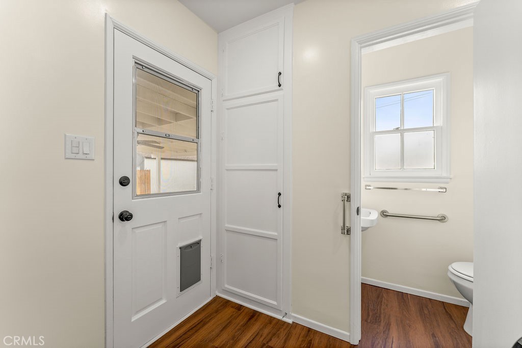 14622 Danbrook Drive Whittier, CA 90604 - Photo 17 of 38 a view of a hallway with wooden floor and a bathroom