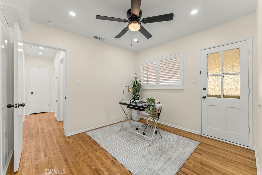 14622 Danbrook Drive Whittier, CA 90604 - Photo 28 of 38 a view of a livingroom with a chair and wooden floor