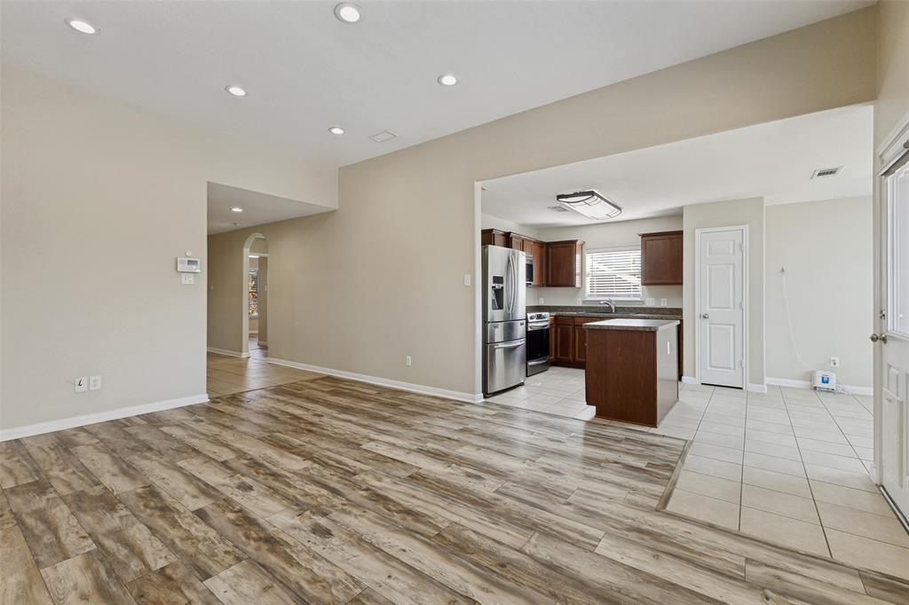 192 Buffalo Ridge Road Newark, TX 76071 - Photo 12 of 33 Living open to the Island Kitchen