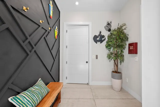 a view of a patio with swimming pool table and chairs