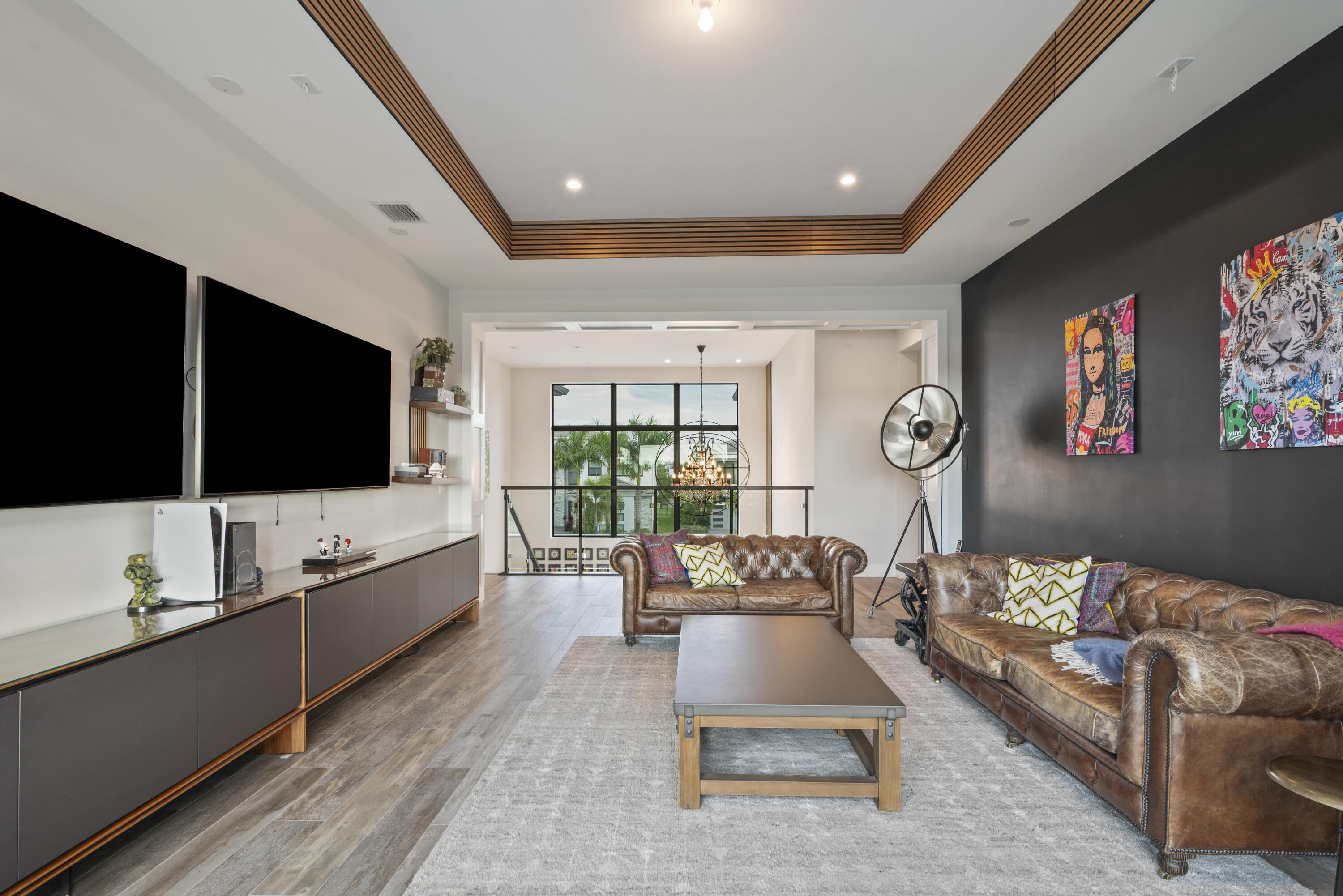 9771 Chianti Classico Terrace Boca Raton, FL 33496 - Photo 46 of 114 a living room with furniture and a flat screen tv