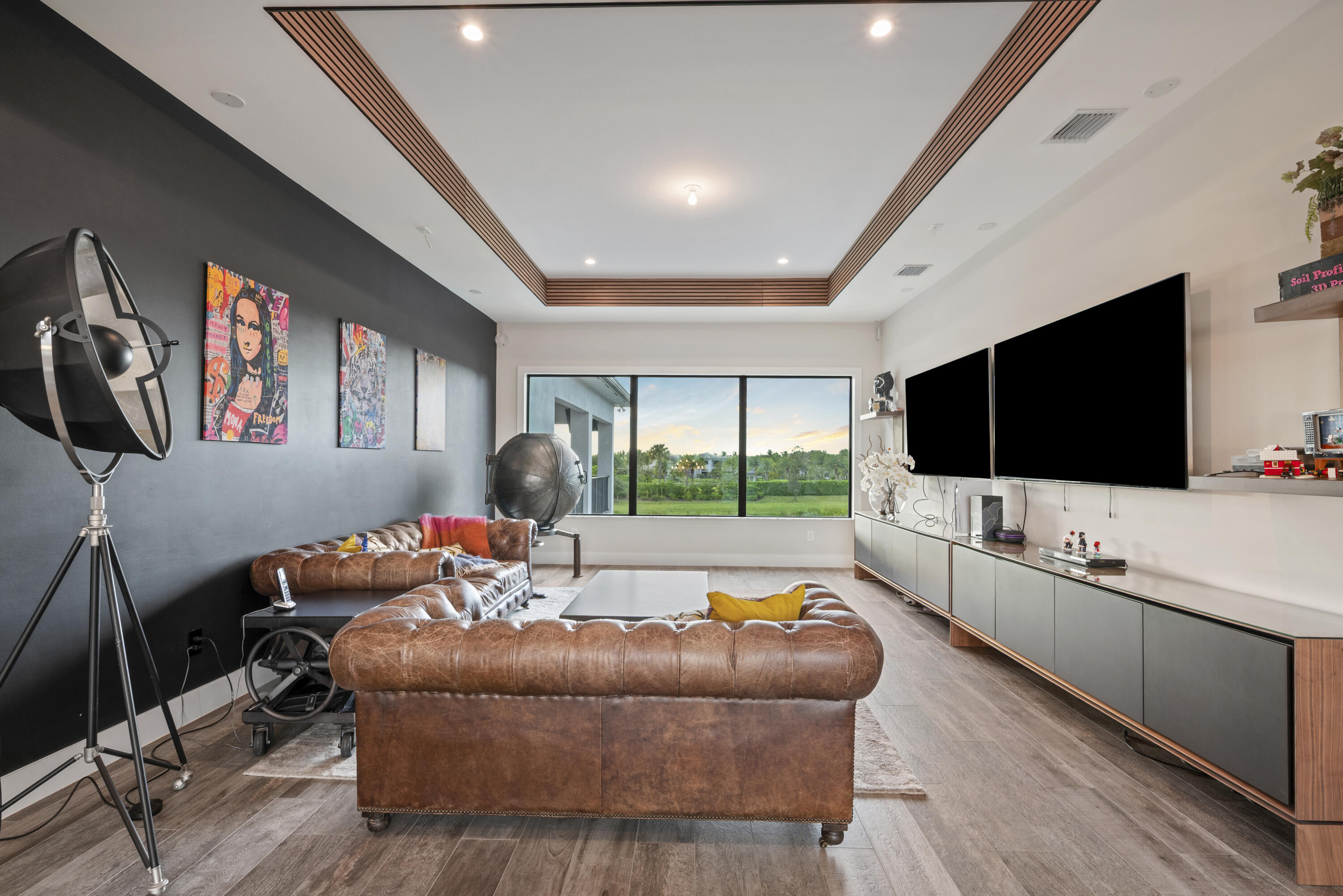 9771 Chianti Classico Terrace Boca Raton, FL 33496 - Photo 47 of 114 a living room with furniture and a flat screen tv