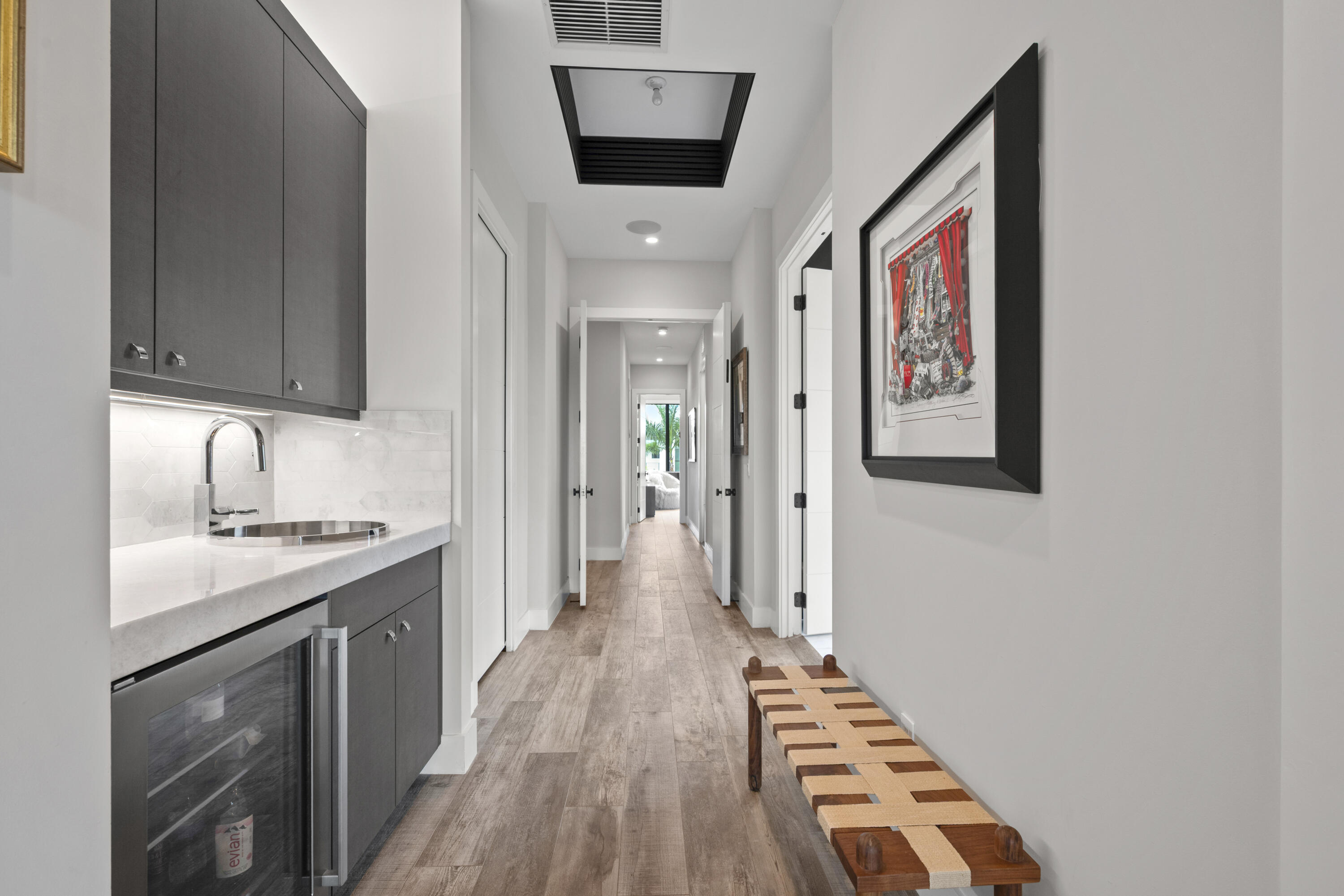 9771 Chianti Classico Terrace Boca Raton, FL 33496 - Photo 49 of 114 a hallway with cabinets and wooden floor