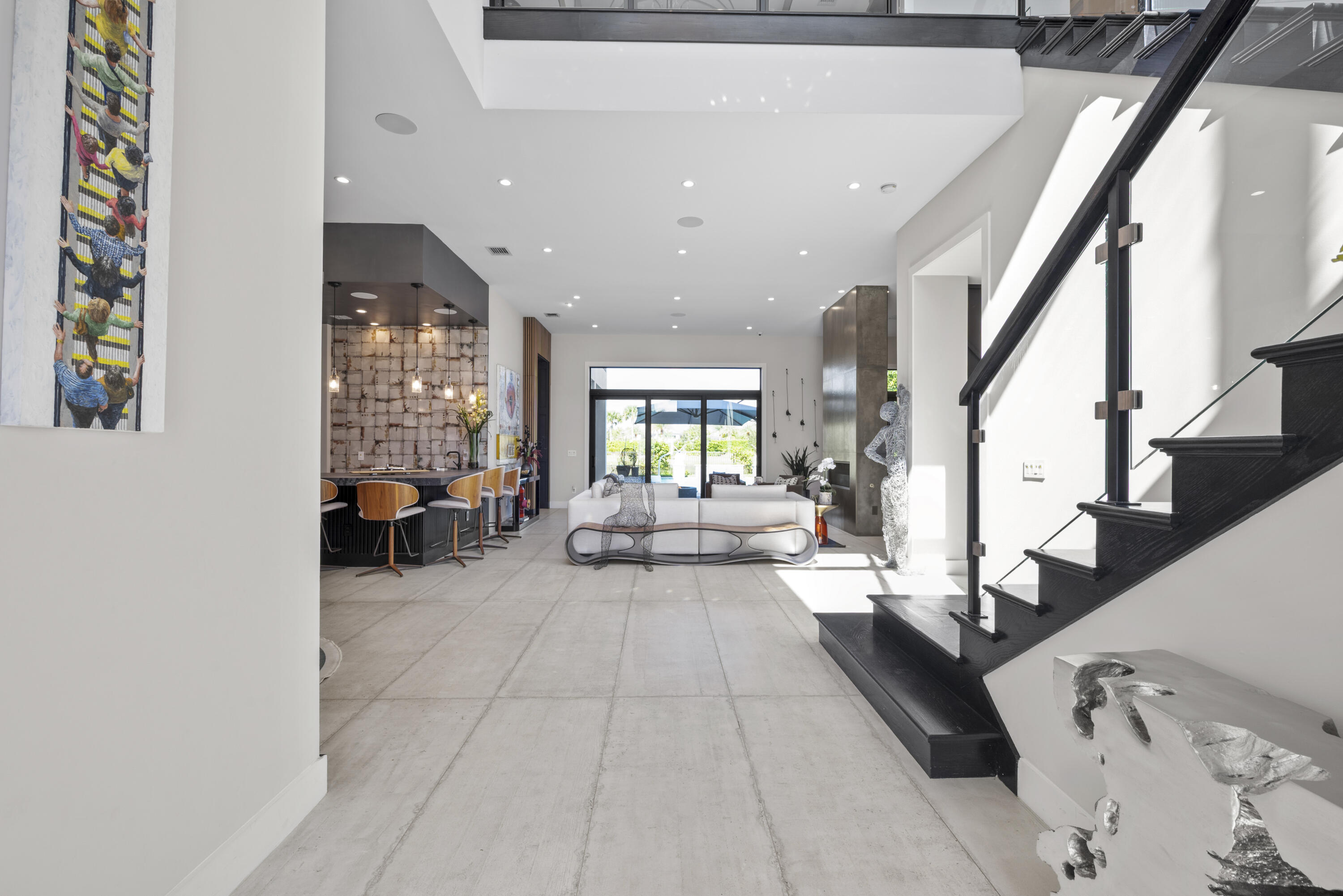 9771 Chianti Classico Terrace Boca Raton, FL 33496 - Photo 6 of 114 a living room with furniture and a fireplace