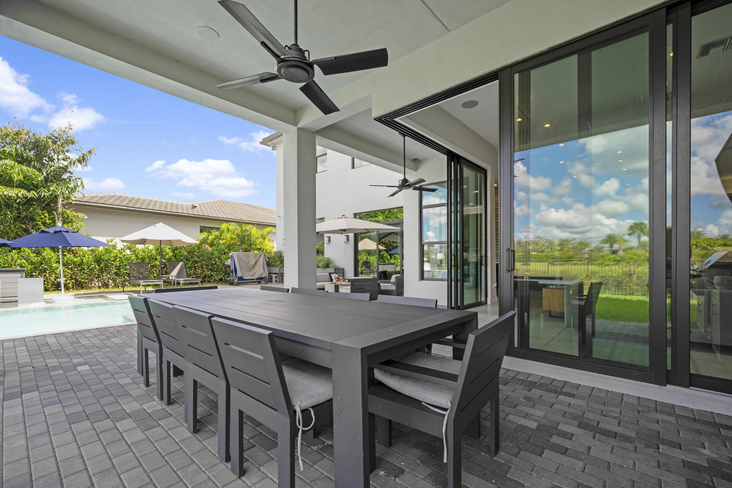 9771 Chianti Classico Terrace Boca Raton, FL 33496 - Photo 85 of 114 a view of an outdoor dining space with furniture