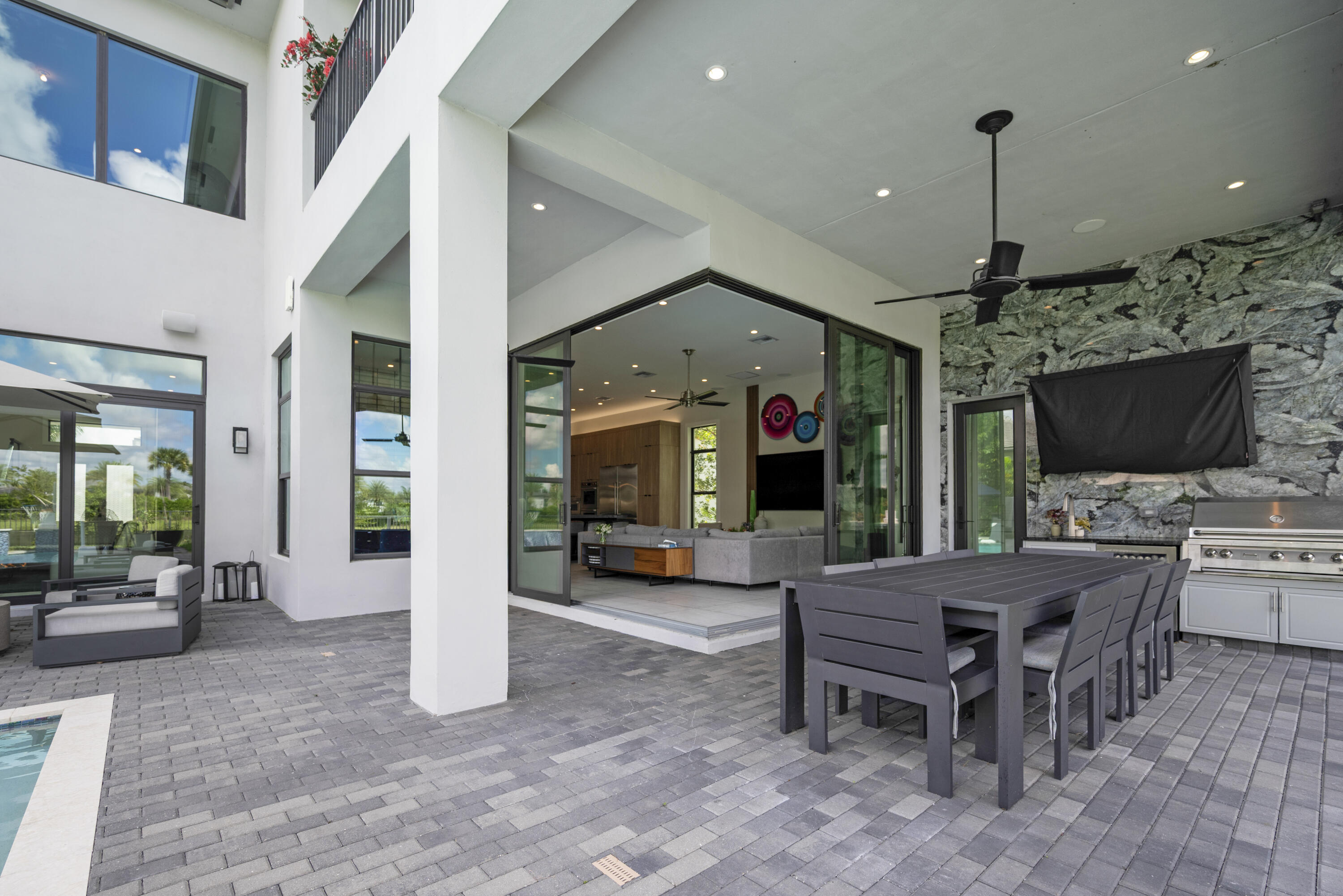 9771 Chianti Classico Terrace Boca Raton, FL 33496 - Photo 86 of 114 a view of a livingroom with furniture flat screen tv and windows