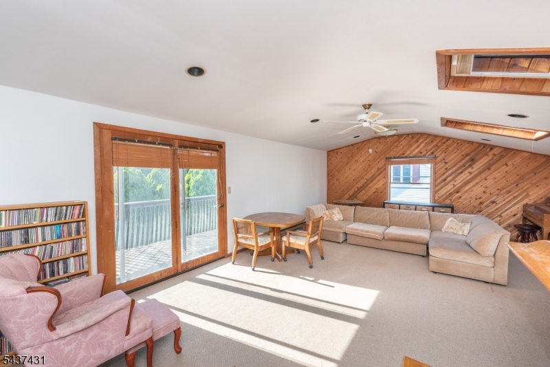20 Wanaque Road West Milford, NJ 07421 - Photo 17 of 31 a living room with furniture and a large window