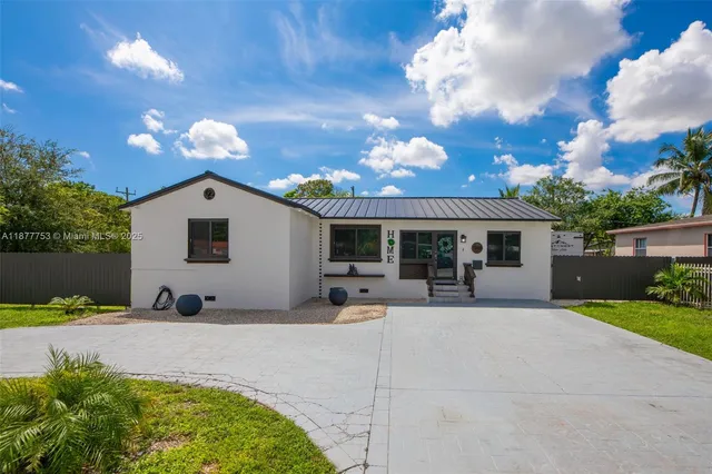 a front view of a house with a patio