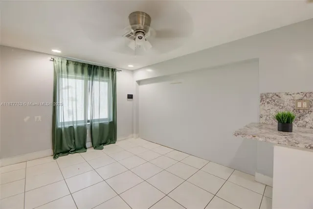 a view of hallway with natural light