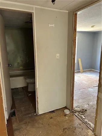 a bathroom with a toilet and a sink