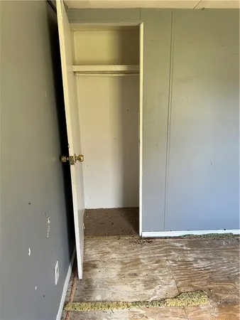 a view of a room that has a window in it