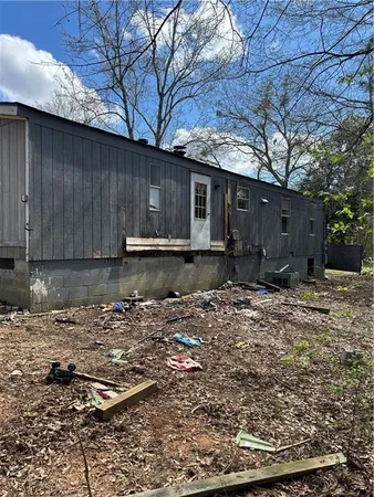 a yard with wooden fence