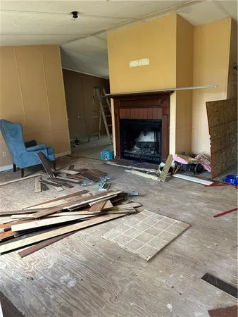 a stove top oven sitting inside of a kitchen
