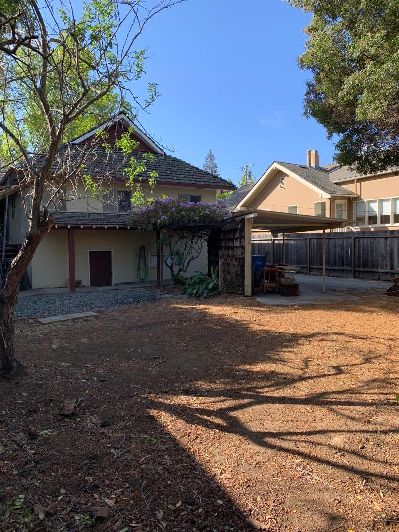 140 Warren Road San Mateo, CA 94401 - Photo 2 of 2 a front view of a house with a yard