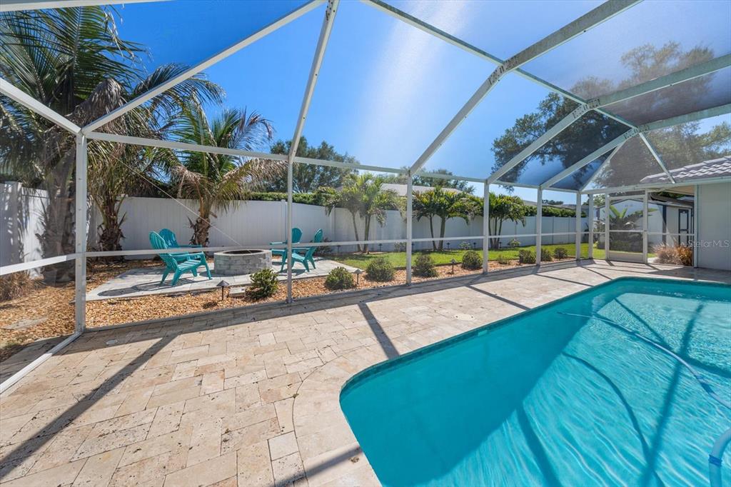 1049 McCarty Street Dunedin, FL 34698 - Photo 34 of 49 a view of a swimming pool with a patio