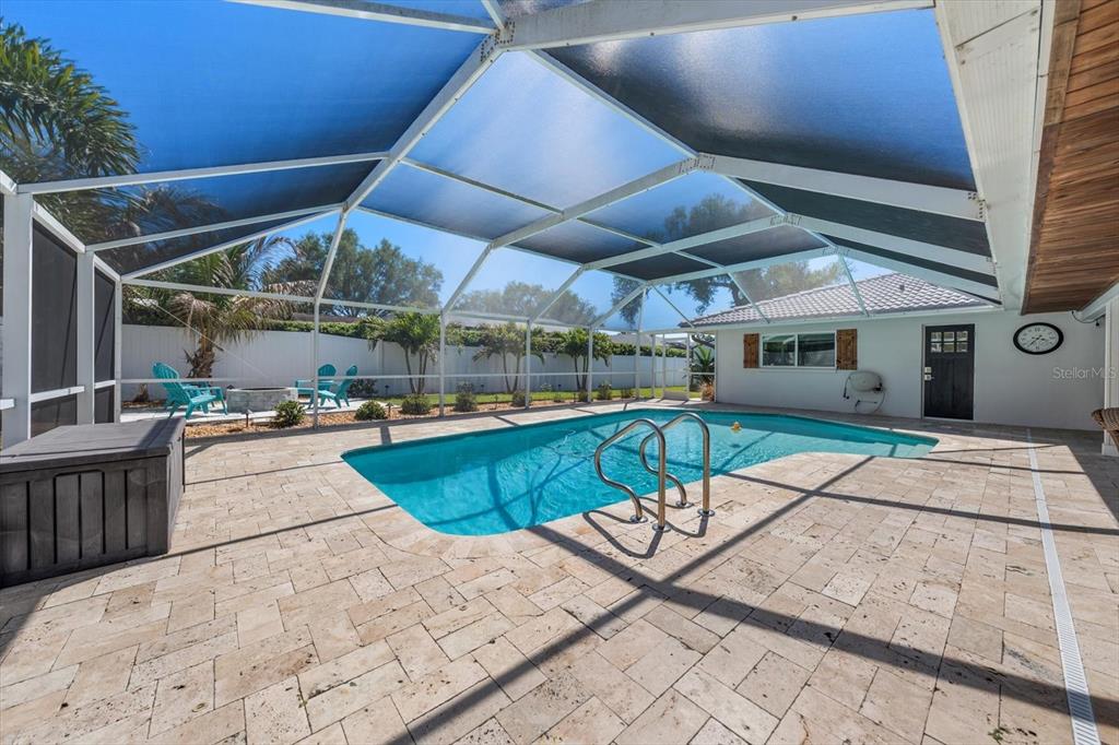 1049 McCarty Street Dunedin, FL 34698 - Photo 36 of 49 a view of a swimming pool with a patio