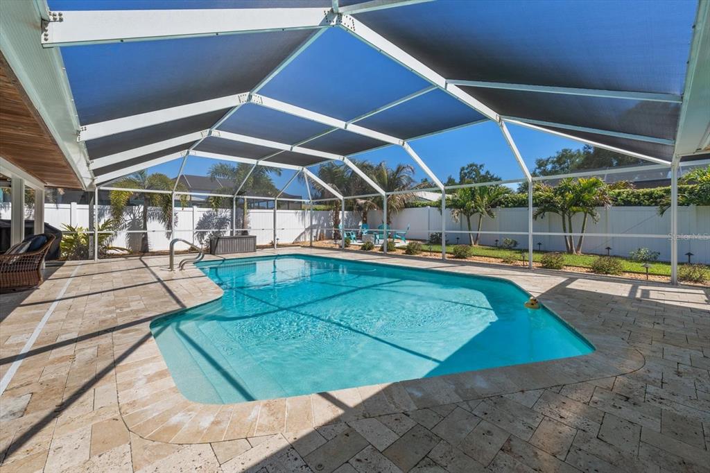 1049 McCarty Street Dunedin, FL 34698 - Photo 37 of 49 a view of a backyard with swimming pool