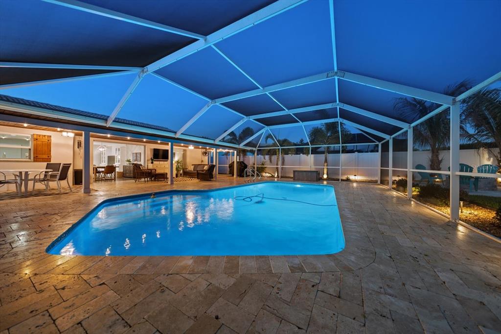 1049 McCarty Street Dunedin, FL 34698 - Photo 38 of 49 a view of a swimming pool with a patio