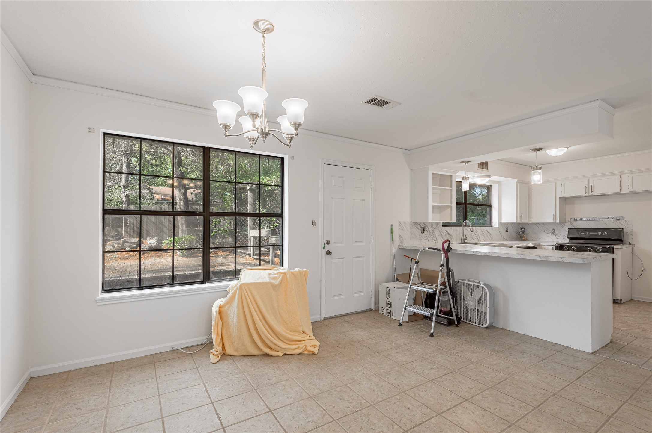 3644 Sage Street Huntsville, TX 77340 - Photo 11 of 20 a living room with a large window