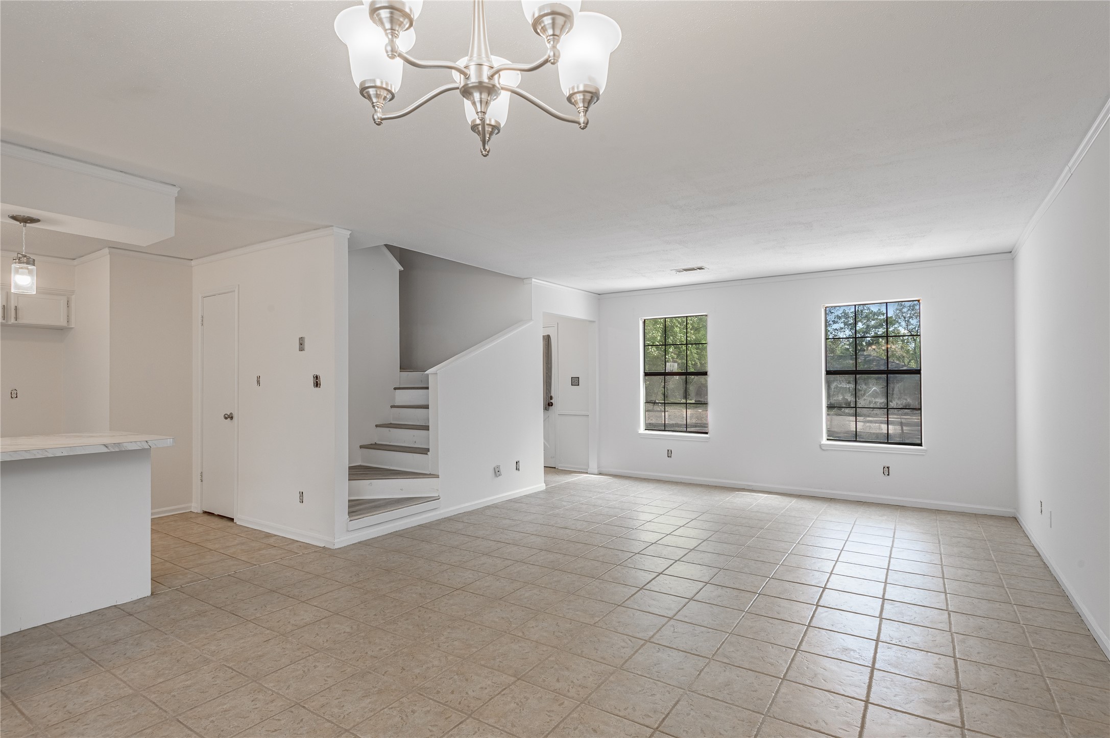 3644 Sage Street Huntsville, TX 77340 - Photo 12 of 20 a view of an empty room with a window