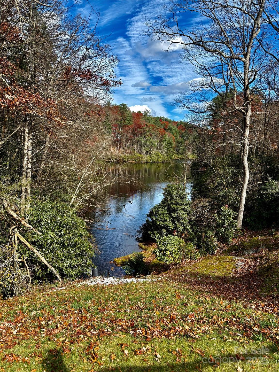 0 Hiwassee Road Lake Toxaway, NC 28747 - Photo 7 of 10 a view of a lake with a mountain