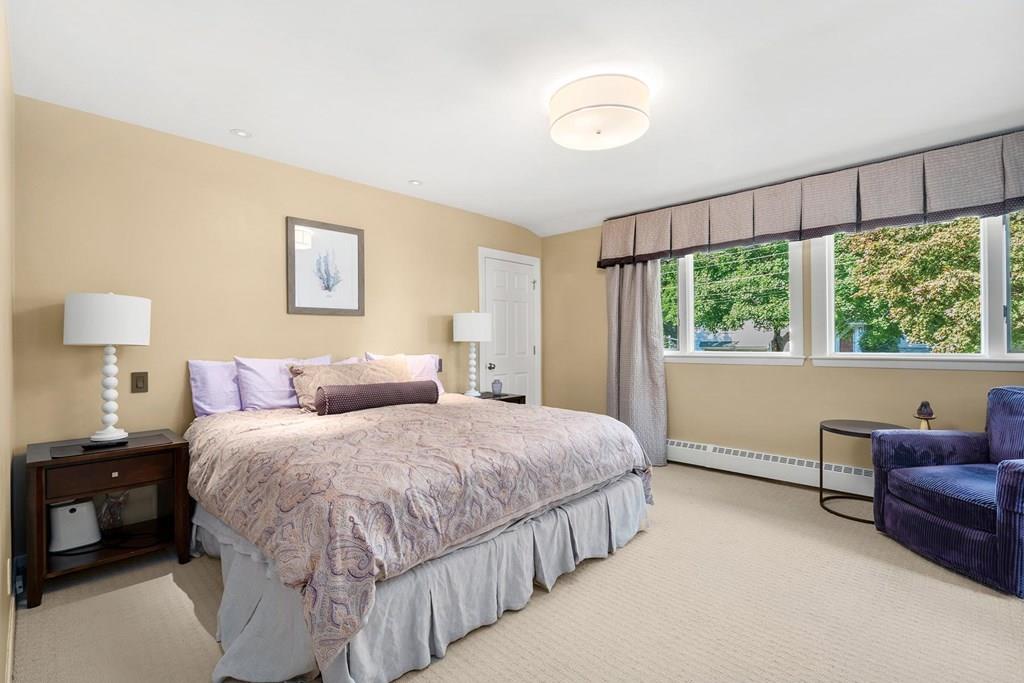64 Adeline Road Newton, MA 02459 - Photo 8 of 14 a bedroom with double bed and a large window