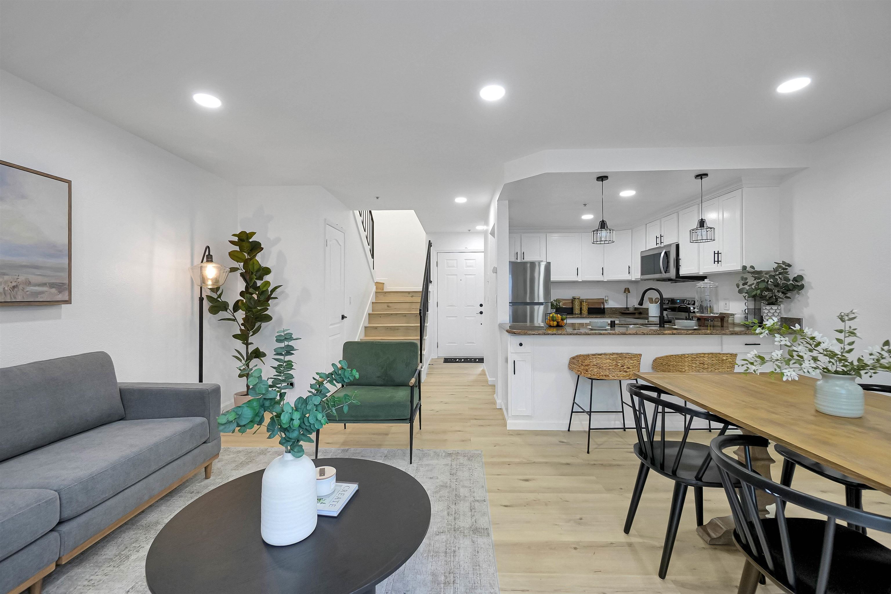 20115 Redwood Road, Unit 9 Castro Valley, CA 94546 - Photo 12 of 47 a living room with furniture kitchen and a potted plant