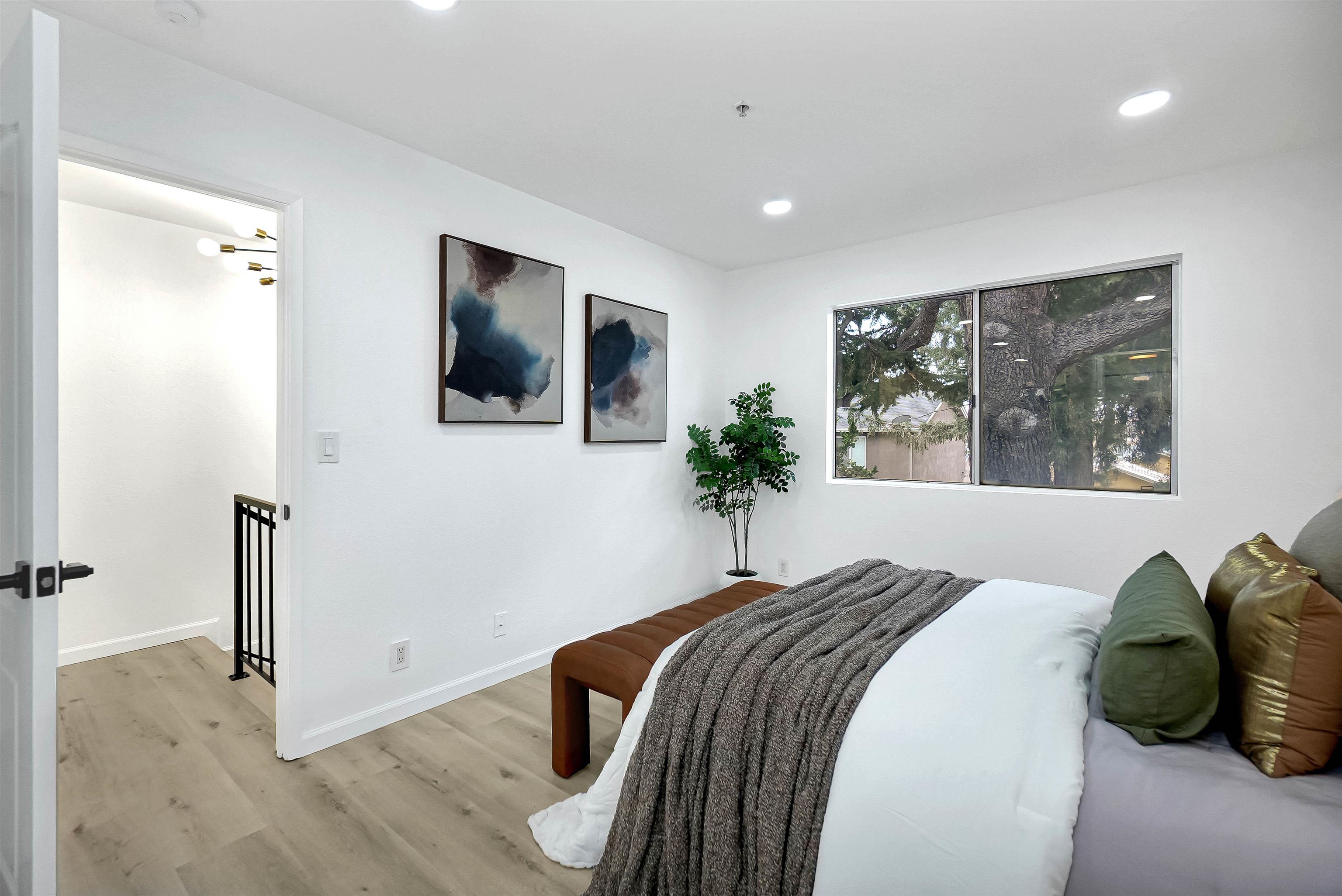 20115 Redwood Road, Unit 9 Castro Valley, CA 94546 - Photo 32 of 47 a bedroom with a bed and a window
