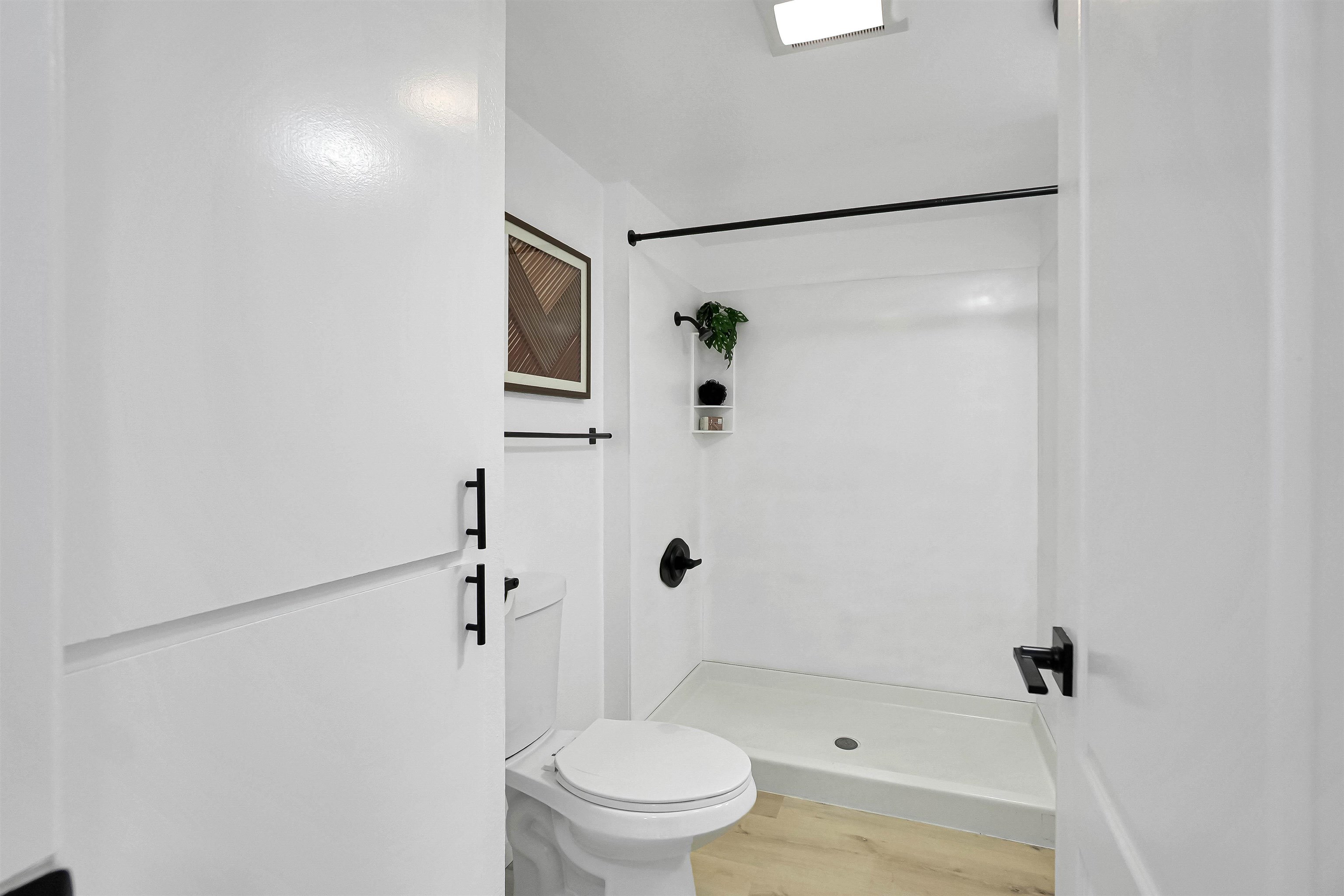 20115 Redwood Road, Unit 9 Castro Valley, CA 94546 - Photo 33 of 47 a white toilet sitting next to a bathroom