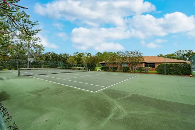 a view of a swimming pool with a patio