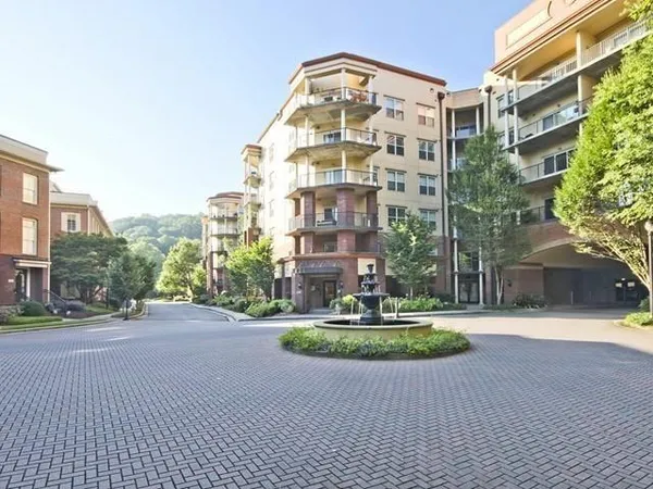 a sign that is in front of flowers