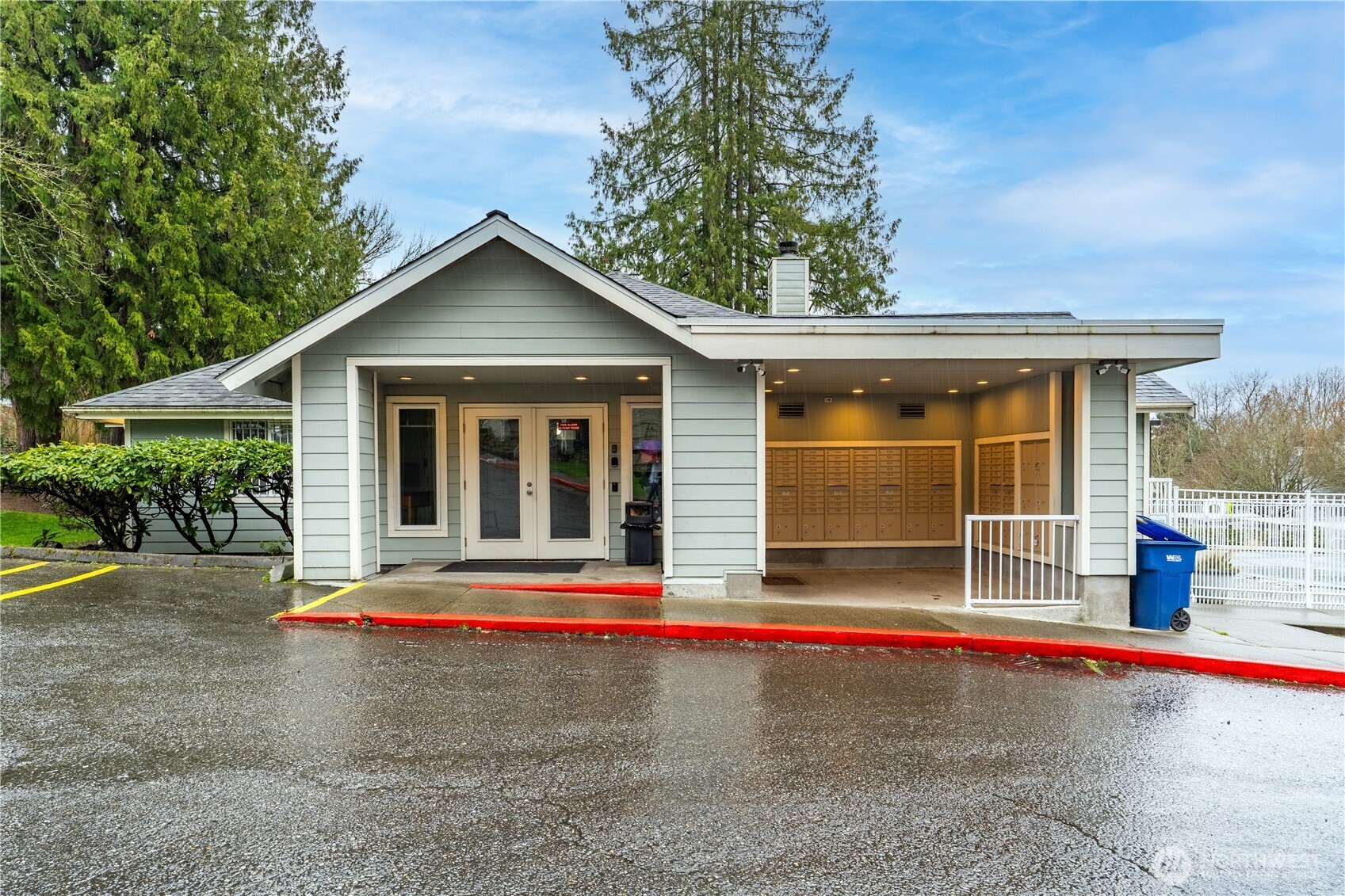 975 Aberdeen Avenue Northeast, Unit F207 Renton, WA 98056 - Photo 23 of 24 a view of a house with a small yard and plants